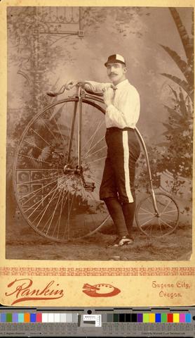 Studio portrait of unidentified male cyclist with penny-farthing bike., 1880-1891 [b001] [004] show page link