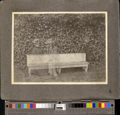 Intentional double exposure of bench with Leila Straub and a young man, possibly Vincent Straub, c. 1901 [b001] [019] [027] show page link