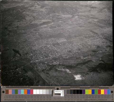 Aerial photo of Eugene. Skinner's Butte at bottom of photo., c. 1960s [b001] [167] show page link