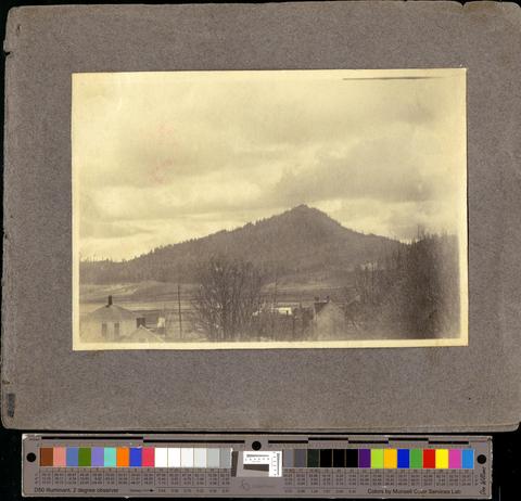 View over rooftops to a peak, possibly Spencer's Butte, c. 1901 [b001] [019] [028] show page link